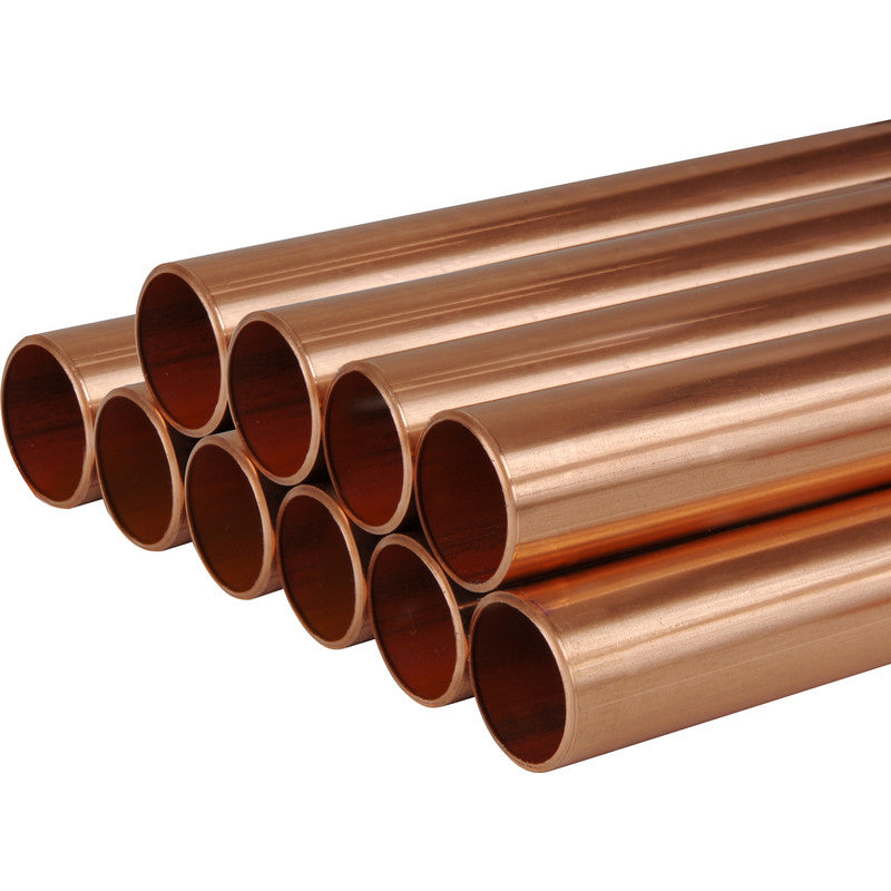 Stack of copper pipes for plumbing or building materials, isolated on white background