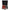 Diamond core drill bit set with red drill bits and accessories in a foam-lined metal case