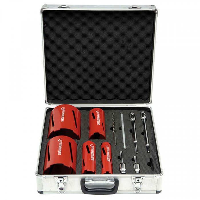 Diamond core drill bit set with red drill bits and accessories in a foam-lined metal case