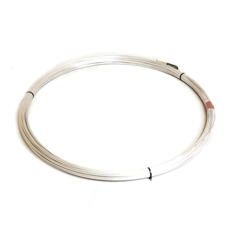 coil of galvanised steel wire for construction or fencing on white background