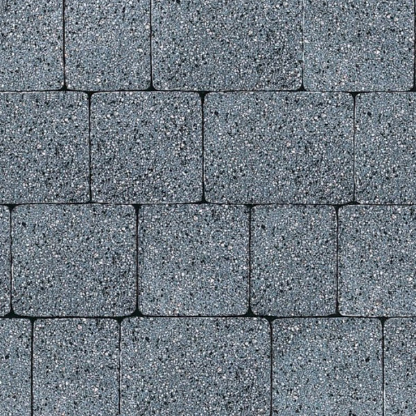 Grey textured concrete paving blocks arranged in a uniform pattern for outdoor surfaces