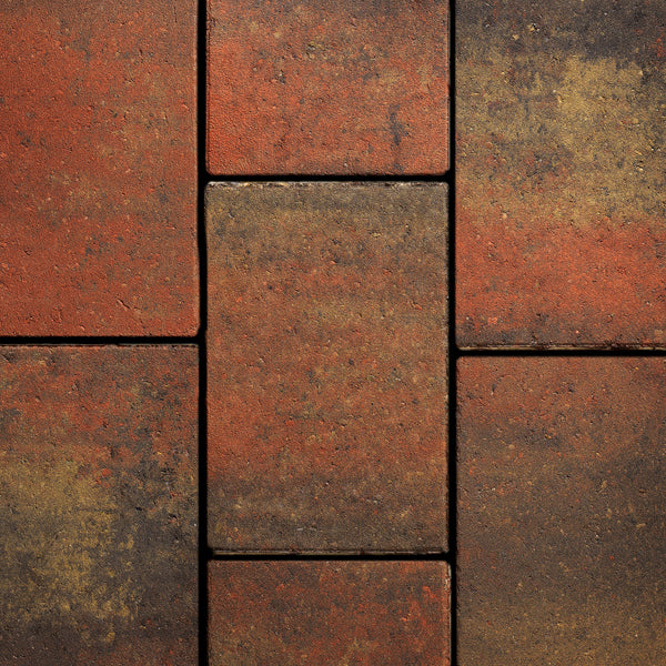 Textured red and brown paving slabs arranged in a close pattern for outdoor landscaping.