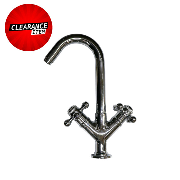 Chrome dual-handle kitchen mixer tap with clearance item label on white background