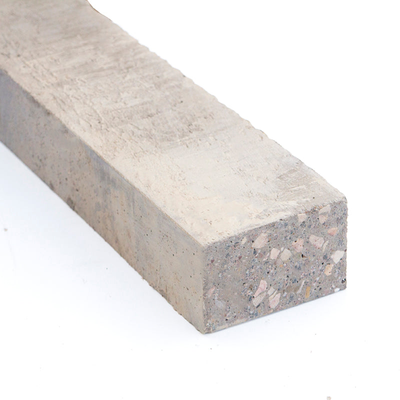 Concrete lintel block for building and construction, close-up on white background