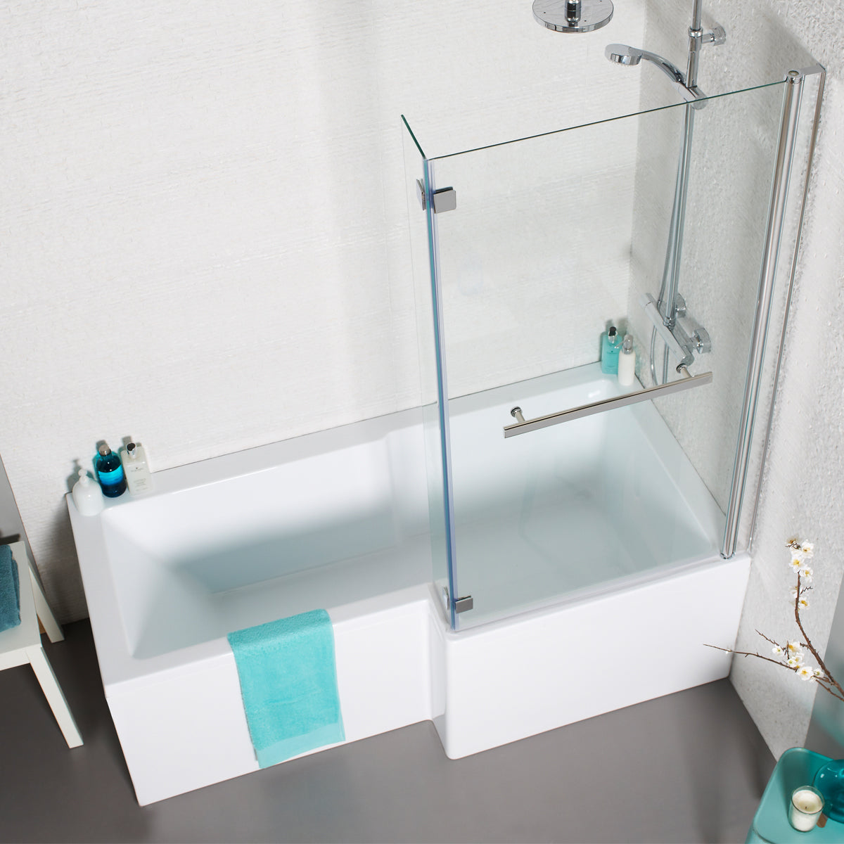 Modern L-shaped shower bath with glass screen, chrome shower, and turquoise accents
