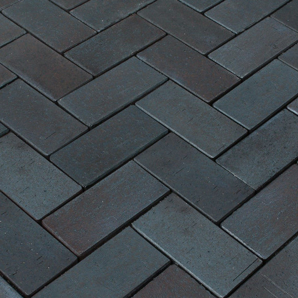 Herringbone pattern dark clay block paving bricks for driveways or patios