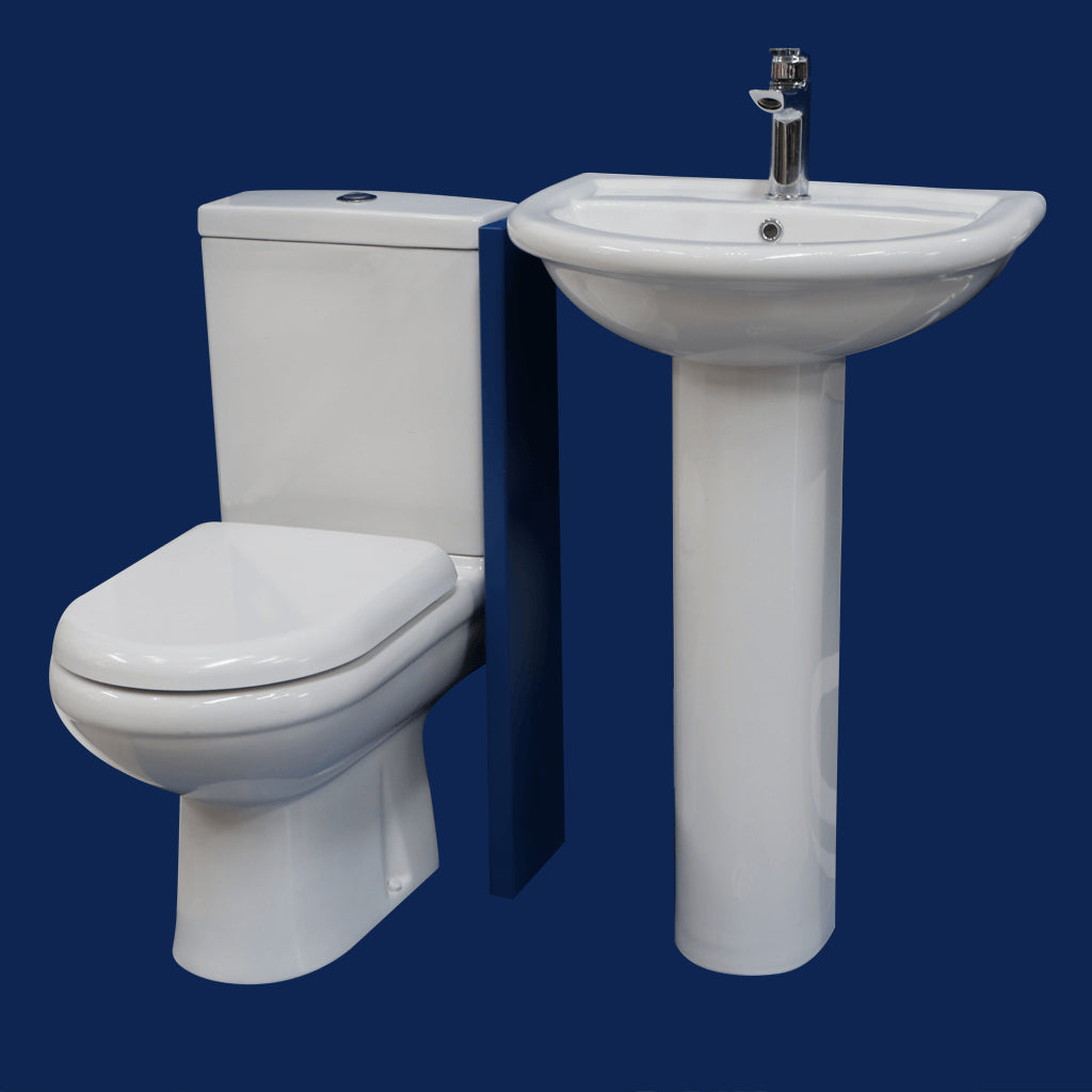 Modern white toilet and pedestal basin bathroom suite on a blue background
