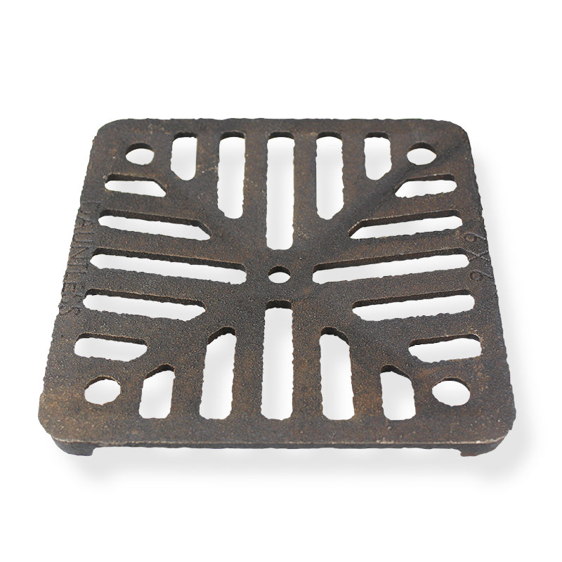 Square cast iron drain cover with slotted pattern for building materials and DIY projects