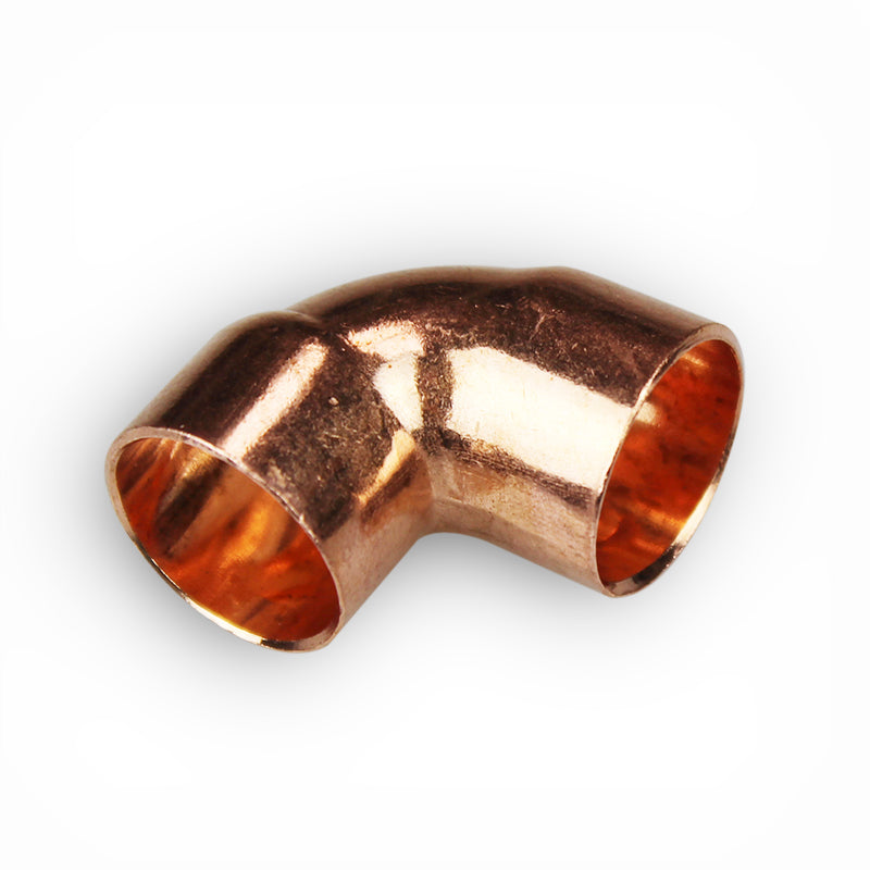 Copper pipe elbow fitting for plumbing, 90 degree connector on white background