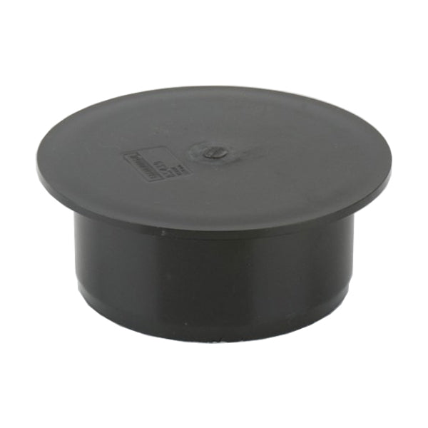 Black plastic drain pipe cap for plumbing or building material applications