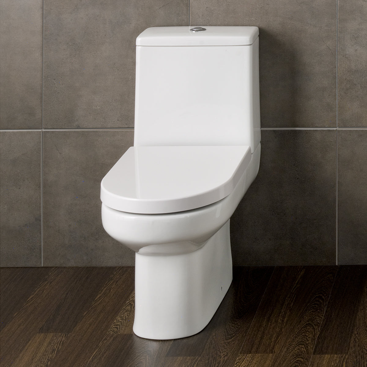 Modern white close-coupled toilet in a bathroom with grey tiles and wood flooring