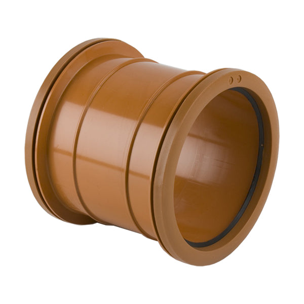 Brown PVC pipe connector with sealing ring for drainage and plumbing installations